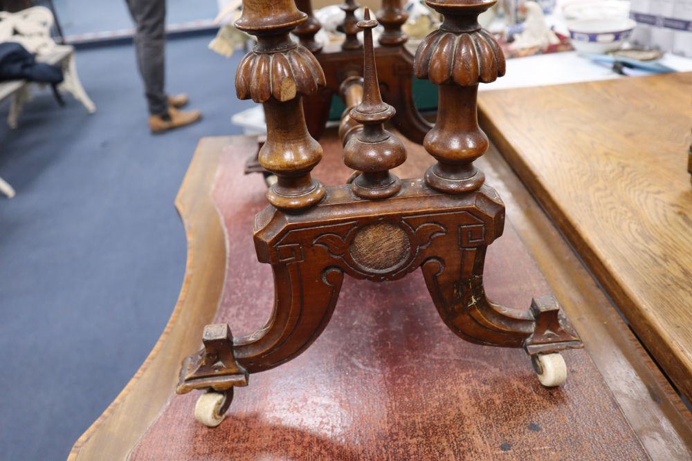 A Victorian inlaid walnut work table, with oval top, width 60cm